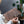 Load image into Gallery viewer, Woman holding the flower journal with a pen