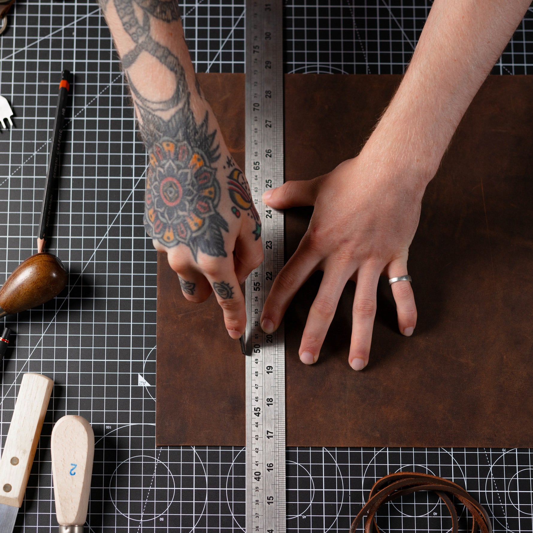 Soft Brown Leather Craft Bundle being cut out by artisan using ruler