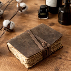 Deckle Edge Vintage Leather Journal with a strap
