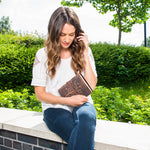 Woman holding a blank Tree of Life Journal 