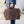 Load image into Gallery viewer, Man holding a Leather Messenger Bag
